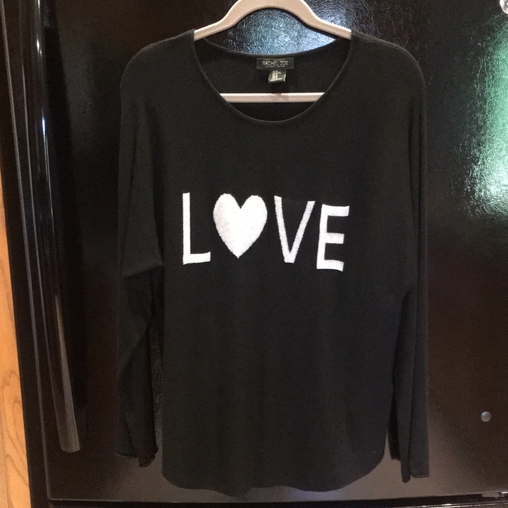 Black sweater with LOVE on the front